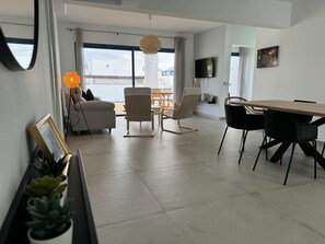 Property, Interior Design, Table, Window, Plant, Wood, Floor, Flooring, Houseplant, Chair