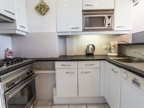 Cabinetry, Kitchen Sink, Property, Sink, White, Countertop, Building, Kitchen Stove, Kitchen, Lighting