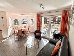 Furniture, Table, Picture Frame, Building, Wood, Window, Chair, Living Room, Flooring, Comfort