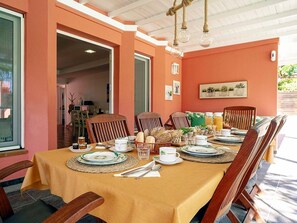 Table, Furniture, Tableware, Property, Chair, Dishware, Interior Design, Lighting, Orange, Tablecloth