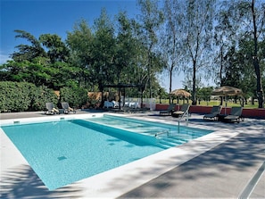 Water, Sky, Swimming Pool, Azure, Shade, Building, Tree, Rectangle, Plant, Leisure