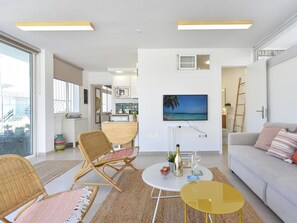 Furniture, Table, Property, Couch, Azure, Picture Frame, Interior Design, Comfort, Lighting, Living Room