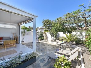 Plant, Sky, Shade, Outdoor Furniture, Building, Landscape, Leisure, Real Estate, Condominium, Facade