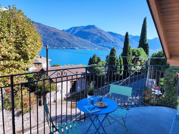 Sky, Plant, Property, Furniture, Table, Mountain, Blue, Azure, Fence, Water