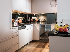 Countertop, Cabinetry, Kitchen Appliance, Kitchen Stove, Home Appliance, Kitchen, Wood, Flooring, Floor, Major Appliance