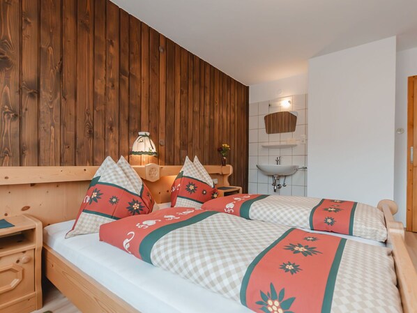 Furniture, Cabinetry, Property, Comfort, Bed Frame, Textile, Interior Design, Wood, Pillow, Building