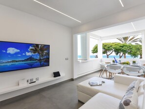 Plant, Azure, Interior Design, Couch, Building, Floor, Window, Living Room, Comfort, Shade