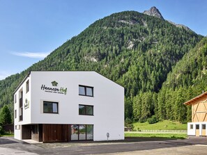 Sky, Mountain, Building, Window, Tree, Plant, Slope, Land Lot, Natural Landscape, House