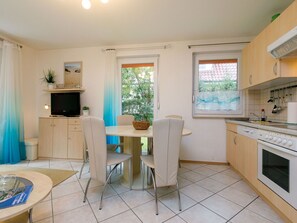 Furniture, Countertop, Cabinetry, Blue, Window, Kitchen, Table, Wood, Interior Design, Home Appliance