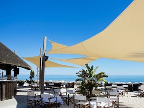 Sky, Table, Furniture, Chair, Azure, Shade, Plant, Outdoor Furniture, Building, Body Of Water