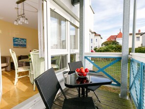 Furniture, Table, Property, Building, Chair, Shade, Outdoor Furniture, Interior Design, Outdoor Table, Plant
