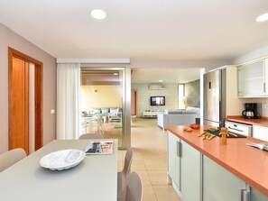 Sky, Property, Furniture, Table, Building, Water, Chair, Wood, Shade, Interior Design