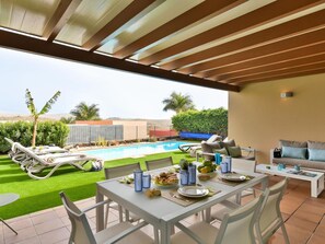 Sky, Property, Furniture, Table, Building, Water, Chair, Wood, Shade, Interior Design