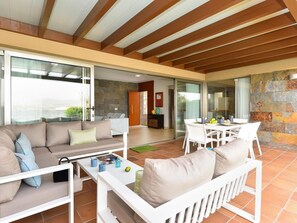 Sky, Property, Furniture, Table, Building, Water, Chair, Wood, Shade, Interior Design