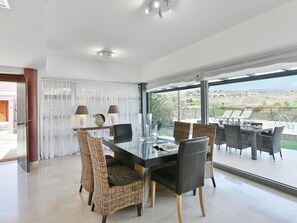 Sky, Property, Furniture, Table, Building, Water, Chair, Wood, Shade, Interior Design