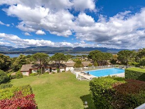 Cloud, Sky, Plant, Water, Natural Landscape, Azure, Tree, Architecture, Vegetation, Land Lot