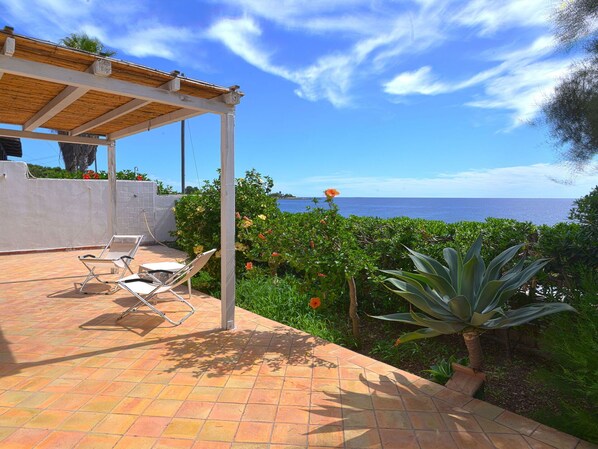 Cloud, Sky, Plant, Building, Property, Flower, Shade, House, Arecales, Outdoor Furniture