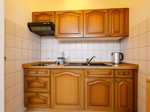 Brown, Cabinetry, Property, Countertop, Sink, Kitchen Sink, Tap, Wood, Kitchen, Interior Design