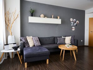 Furniture, Wood, Interior Design, Couch, Rectangle, Living Room, Yellow, Floor, Picture Frame