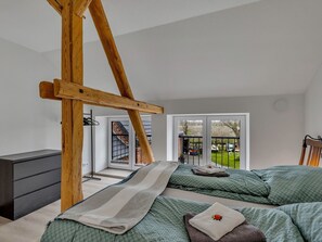 Interior Design, Furniture, Flooring, Bedroom, Floor, Bed, Wood, Ceiling, Room, Wood Flooring