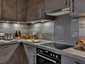 Kitchen, Countertop, Kitchen Appliance, Cabinetry, Flooring, Major Appliance, Home Appliance, Home, Kitchen Stove, Stove