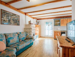 Furniture, Cabinetry, Building, Picture Frame, Wood, Interior Design, Architecture, Living Room, Window, Flooring