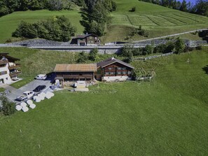 Building, Ecoregion, Plant, House, Land Lot, Natural Landscape, Highland, Grass, Cottage, Grassland