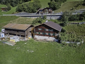 Building, Plant, Window, Natural Landscape, Land Lot, House, Tree, Slope, Grass, Cottage
