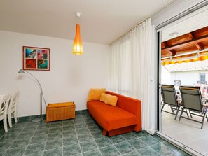 Furniture, Comfort, Couch, Orange, Wood, Living Room, Flooring, Architecture, Interior Design, Floor