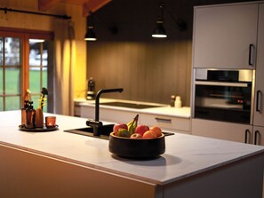 Countertop, Property, Cabinetry, Sink, Kitchen, Tap, Kitchen Appliance, Interior Design, Kitchen Stove, Kitchen Sink