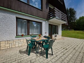 Building, Plant, Window, Property, Furniture, Table, Road Surface, Flowerpot, Wood, Architecture