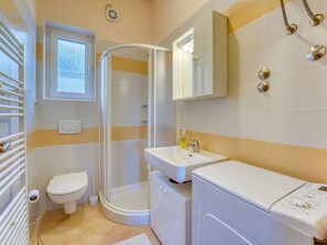 Mirror, Plumbing Fixture, Property, Sink, Furniture, Tap, Building, Purple, Bathroom