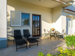 Property, Furniture, Plant, Table, Shade, Interior Design, Building, Flooring, Living Room, Chair