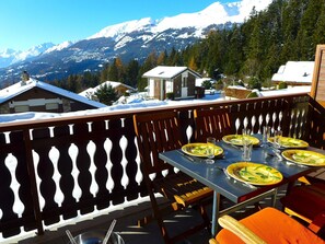 Sky, Property, Building, Mountain, Table, Snow, Tableware, Tree, House, Outdoor Furniture