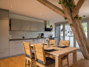 Cabinetry, Countertop, Furniture, Property, Table, Chair, Wood, Kitchen, Lighting, Interior Design