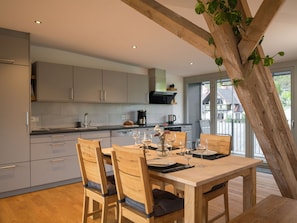 Cabinetry, Countertop, Furniture, Property, Table, Chair, Wood, Kitchen, Lighting, Interior Design