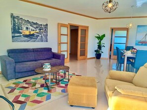 Furniture, Couch, Property, Plant, Blue, Picture Frame, Azure, Living Room, Houseplant, Interior Design