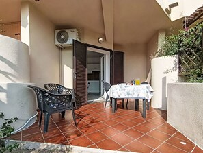 Floor, Flooring, Shade, Balcony, Wood Stain, Chair, Tile, Houseplant