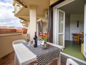Table, Furniture, Property, Building, Cloud, Chair, Flower, Textile, Houseplant, Plant