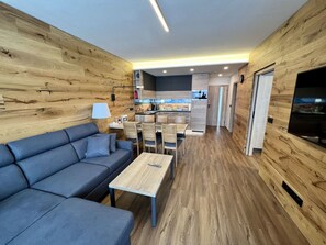 Wood, Interior Design, Couch, Building, Living Room, Floor, Flooring, Hardwood, Television, Wood Stain