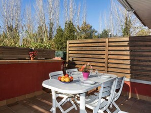 Sky, Table, Wood, Outdoor Furniture, Building, Outdoor Table, Shade, Tree, Interior Design, House