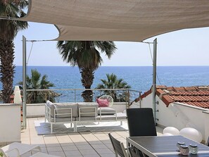 Water, Table, Furniture, Sky, Property, Building, Chair, Azure, Plant, Shade
