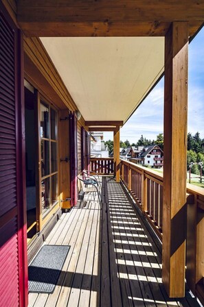 Wood, Sky, Architecture, Shade, Tree, Hardwood, Fence, Leisure, Porch, Flooring