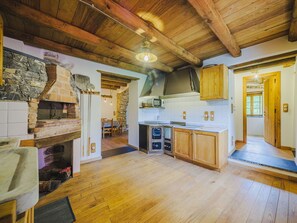 Property, Cabinetry, Couch, Wood, Interior Design, Living Room, Kitchen, Floor, Flooring, Beam