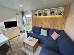 Furniture, Property, Couch, Picture Frame, Comfort, Interior Design, Flooring, Floor, Living Room, Table