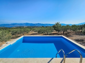 Water, Sky, Water Resources, Property, Swimming Pool, Plant, Blue, Rectangle, Shade, Natural Landscape