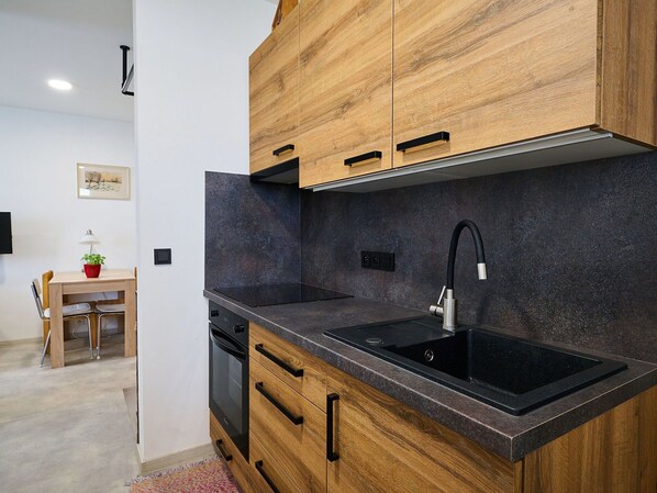 Cabinetry, Furniture, Countertop, Sink, Tap, Kitchen Sink, Building, Plumbing Fixture, Wood, Interior Design