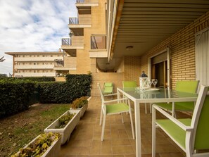 Plant, Building, Table, Sky, Window, Cloud, Chair, Outdoor Furniture, Wood, Outdoor Table