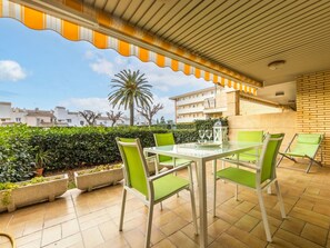 Plant, Furniture, Sky, Table, Cloud, Property, Chair, Building, Shade, Outdoor Furniture