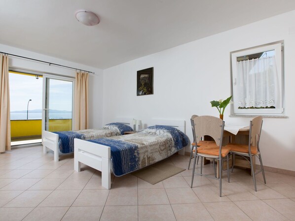 Furniture, Property, Plant, Window, Comfort, Table, Building, Wood, Houseplant, Interior Design
